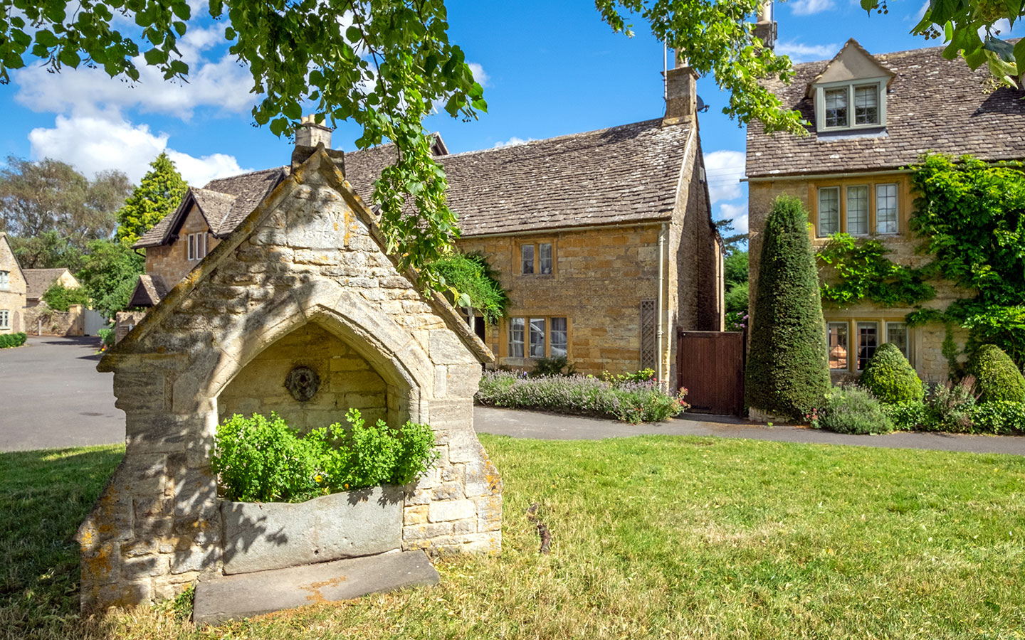 Traditional Cotswolds stone cottages when visiting Lower Slaughter