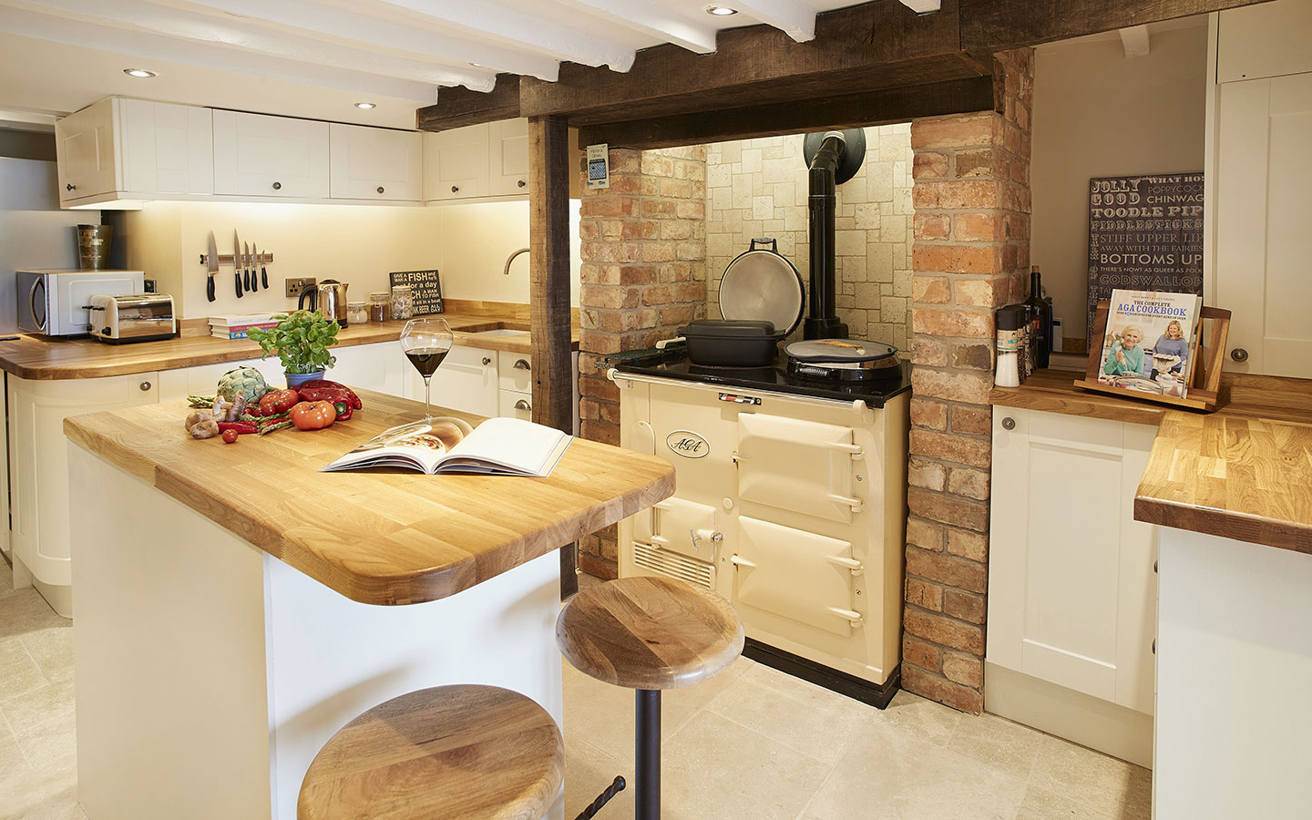 The cosy kitchen with Aga at 39 Foxtail Cottage in the Cotswold village of Blockley