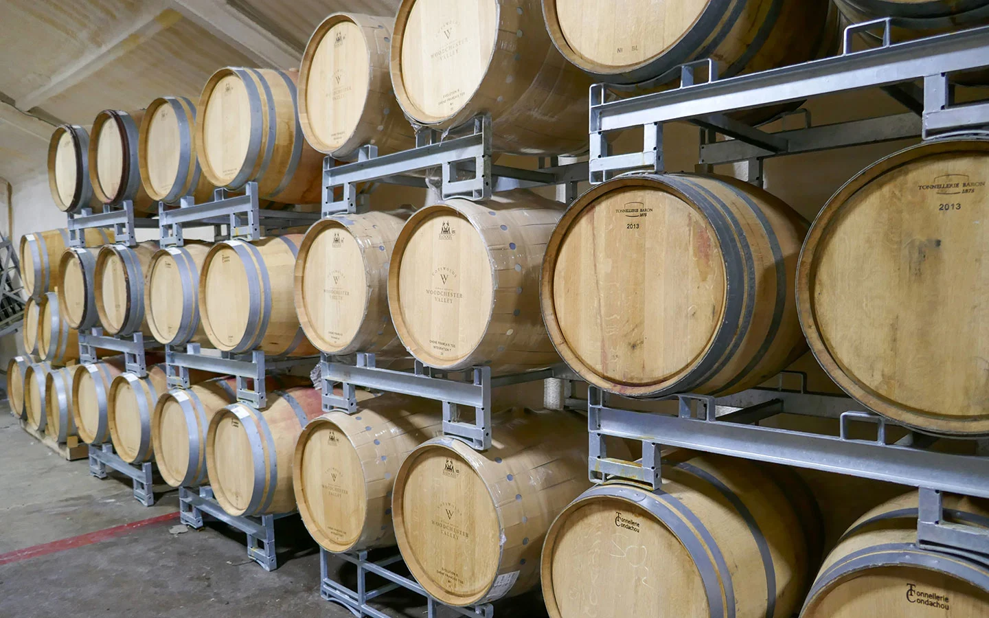 Oak barrels in the winery at Woodchester Valley Vineyard