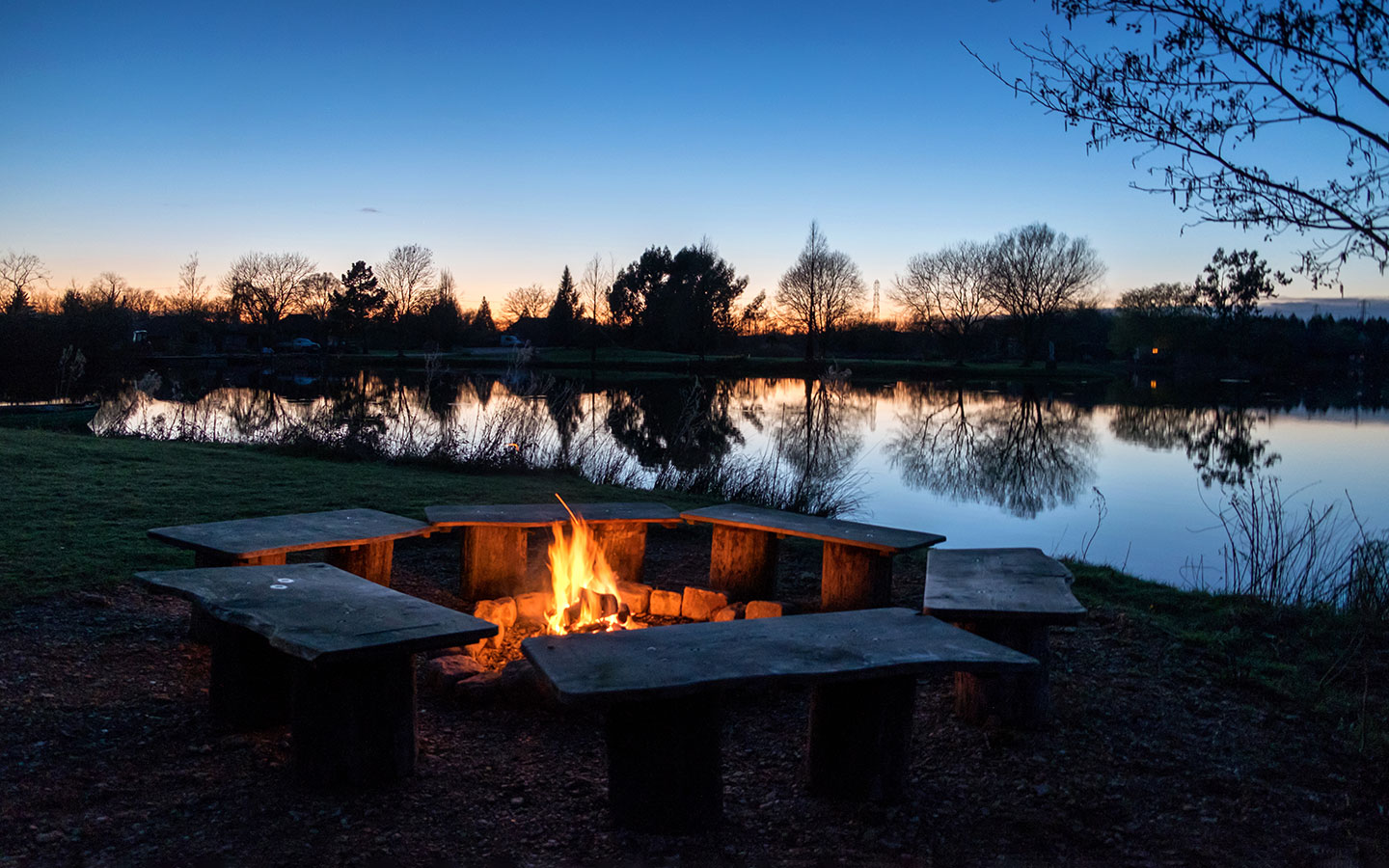 Fire pit at Log House Holidays lakeside hot tub lodges in the Cotswolds