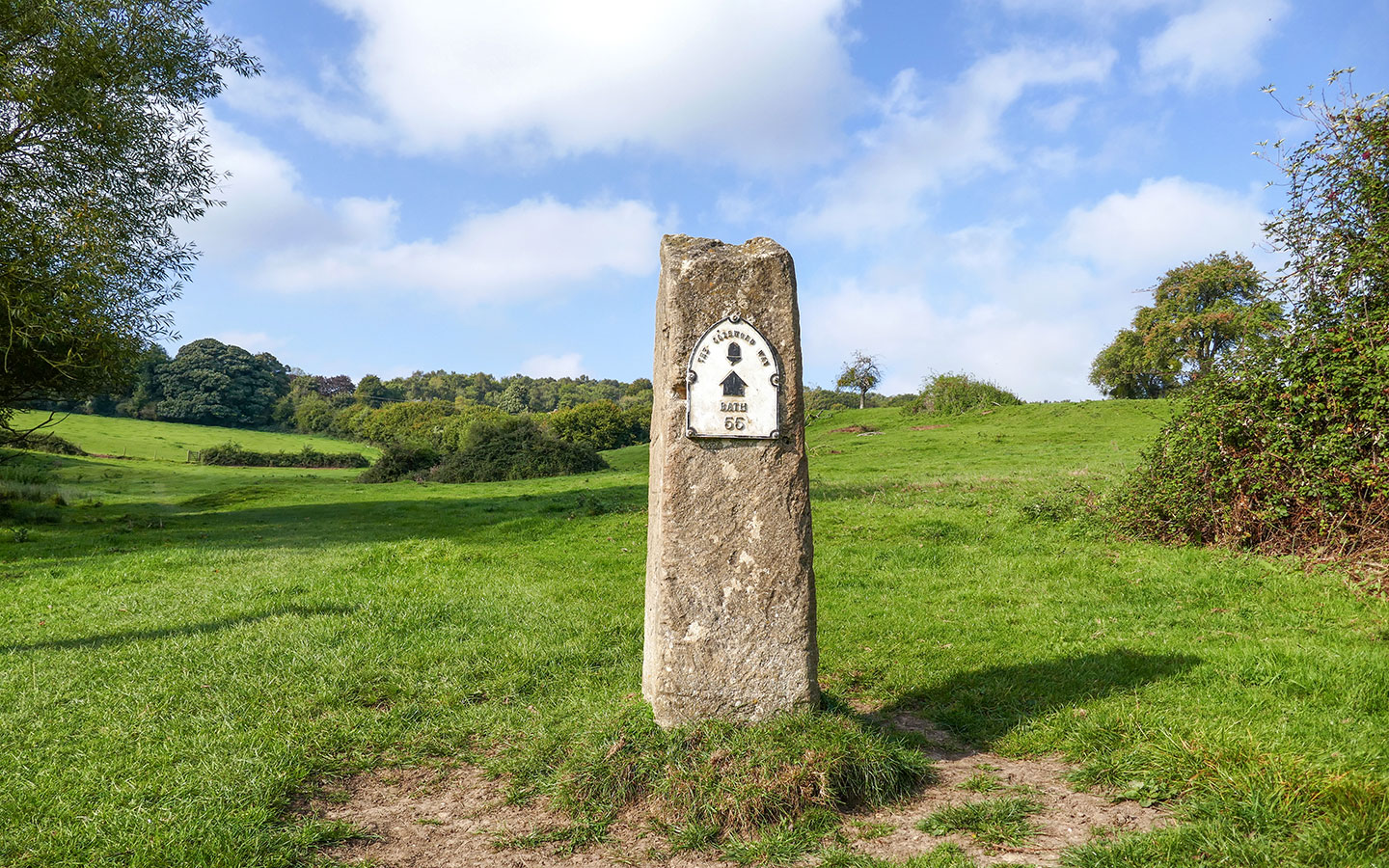 Marker stone on the Cotswold Way marking the way to Bath