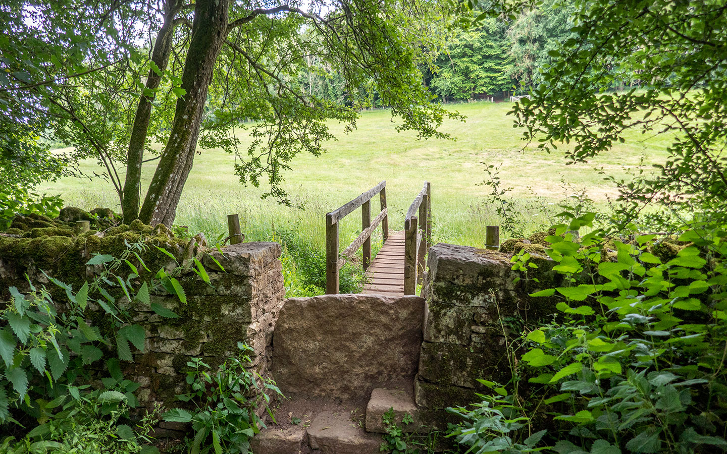 Stone stile on the Coln St Aldwyns to Bibury walk in the Cotswolds 