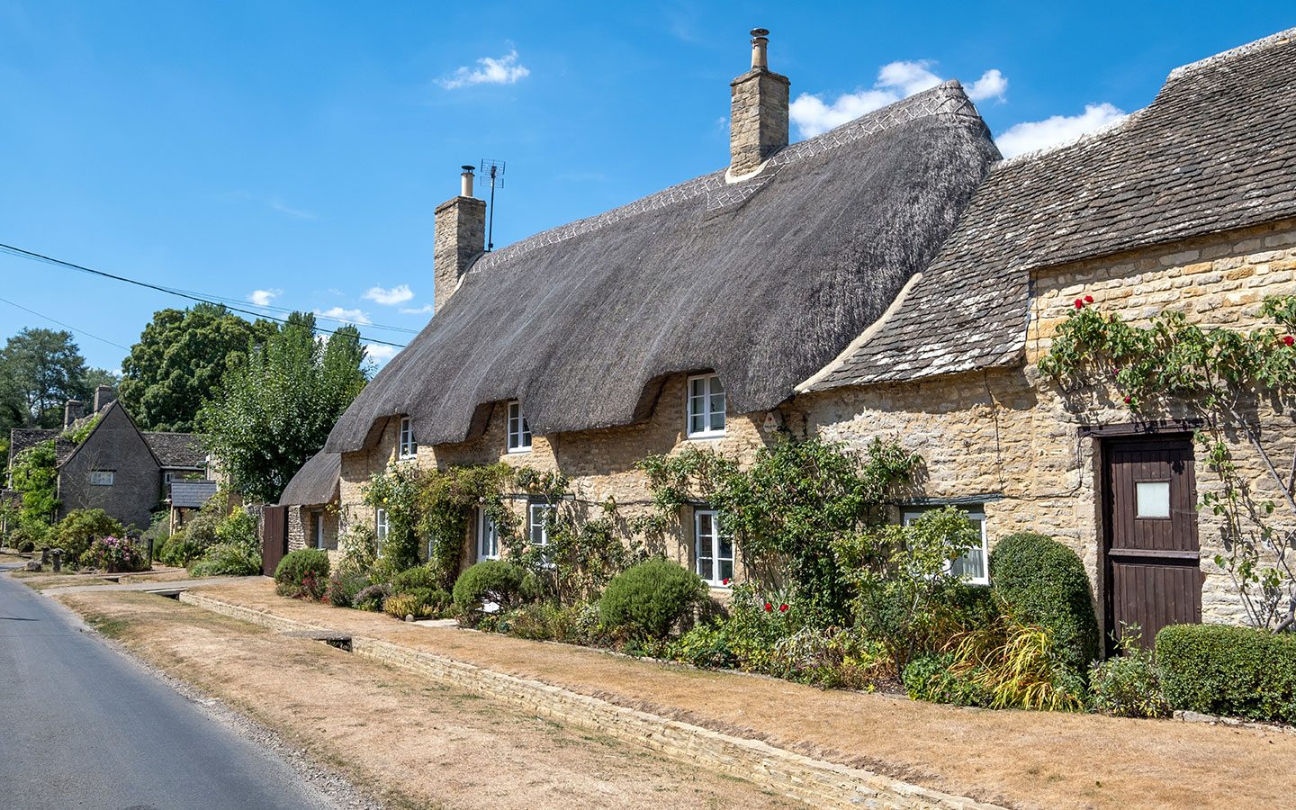 Thatched cottage in Minster Lovell village in the Cotswolds