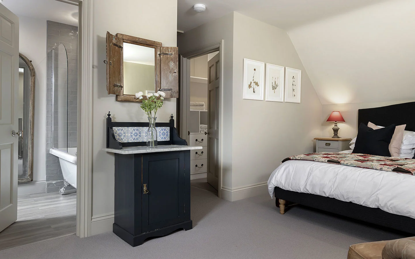 The spacious master bedroom at The Hideaway in Lower Oddington, Cotswolds