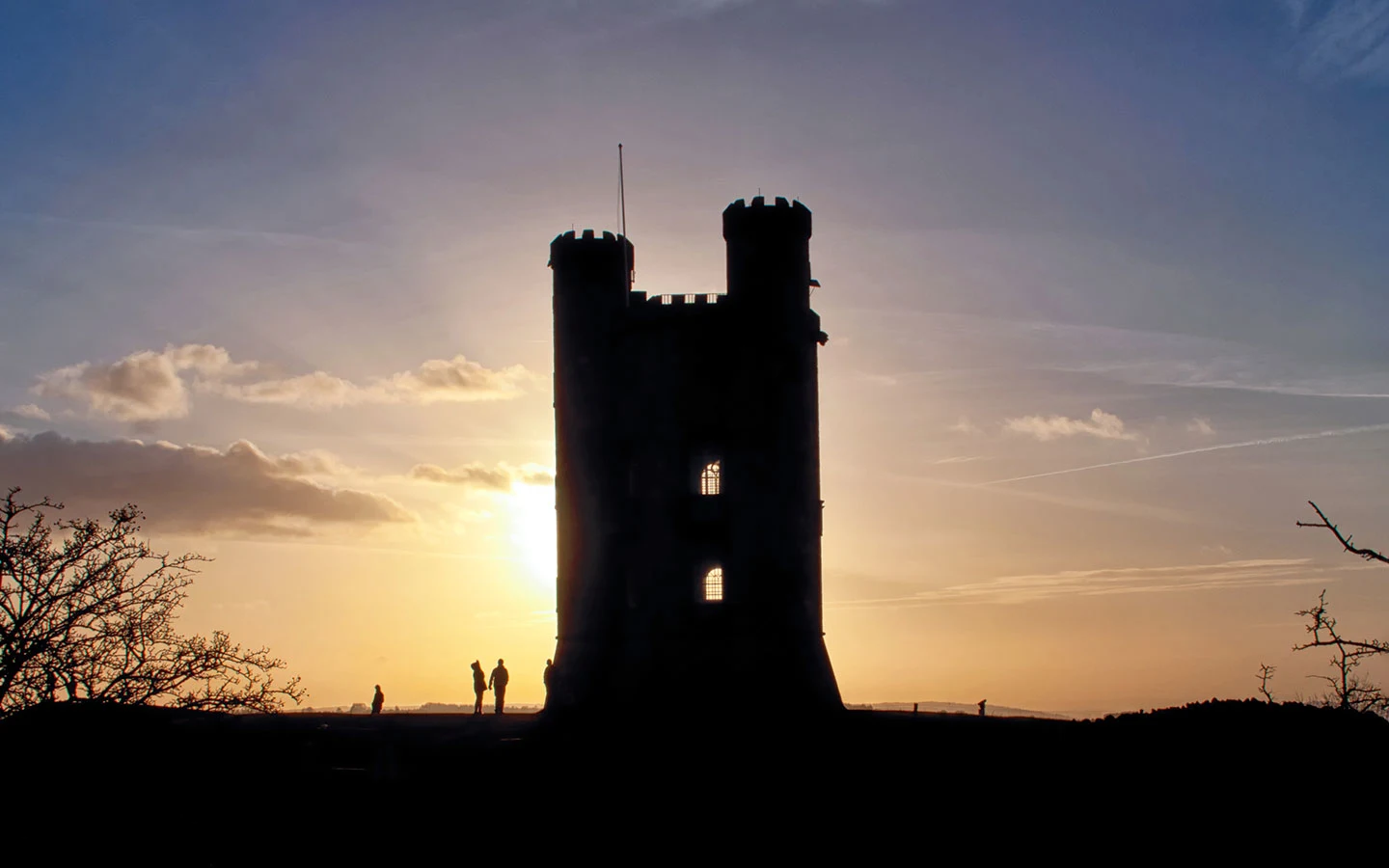 The Broadway Tower silhouetted at sunset