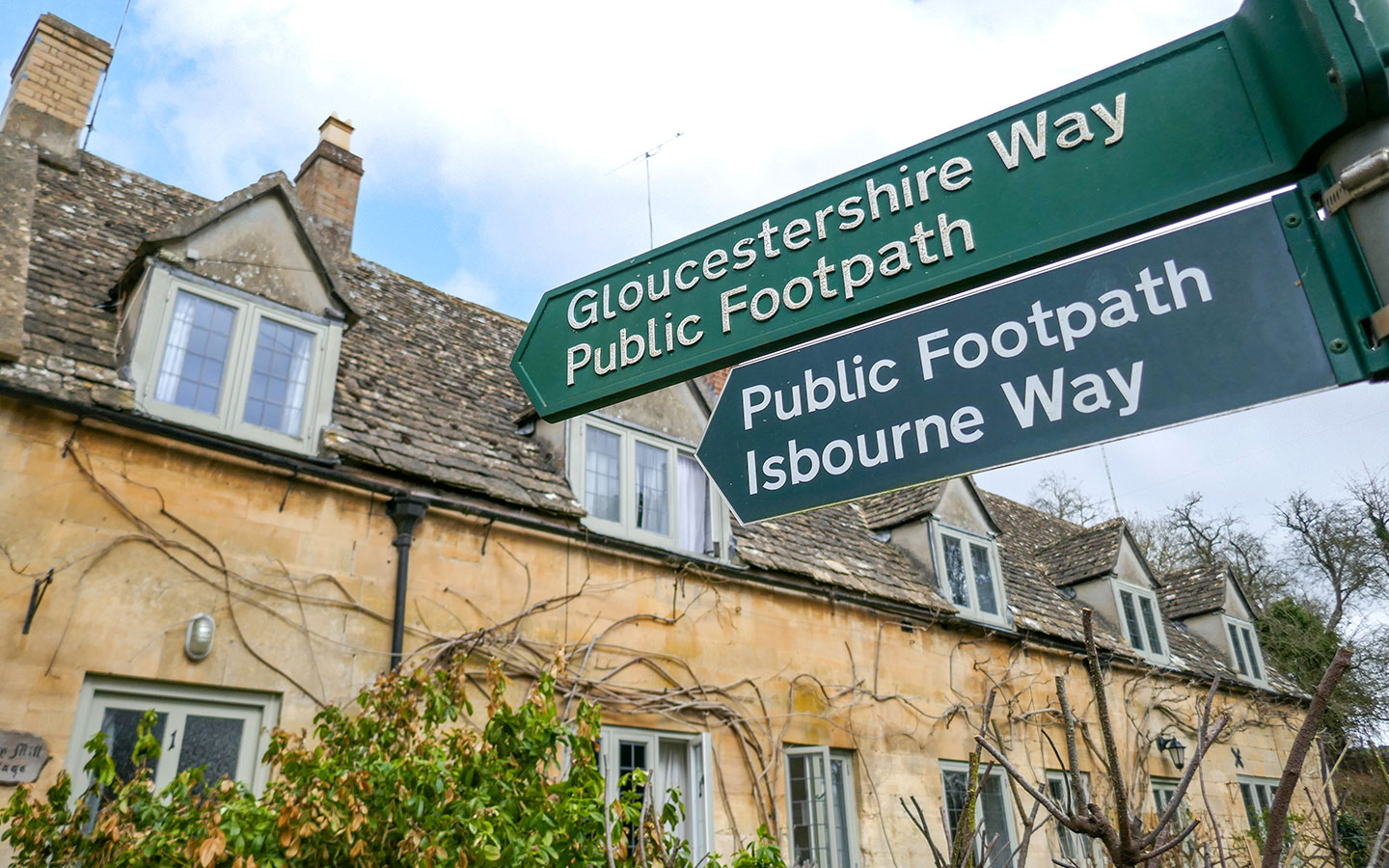 Signpost showing walking routes from Winchcombe in the Cotswolds
